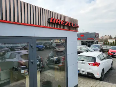 AUTO KOMIS Port Brezelia